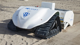 Browse partner beach cleaning bebot sifts through sand to gather small pieces of trash2