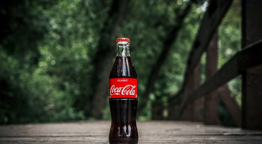 Coca-Cola and Suntory achieve 100% plant-based bottle card